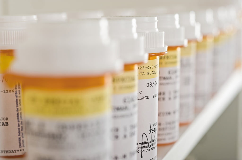 a line of pill bottles