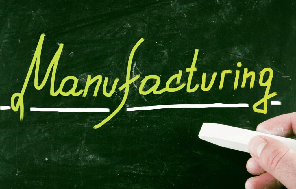 manufacturing is written on a chalkboard