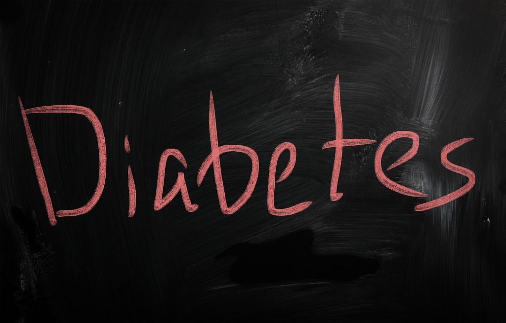 the word diabetes is written on a chalkboard