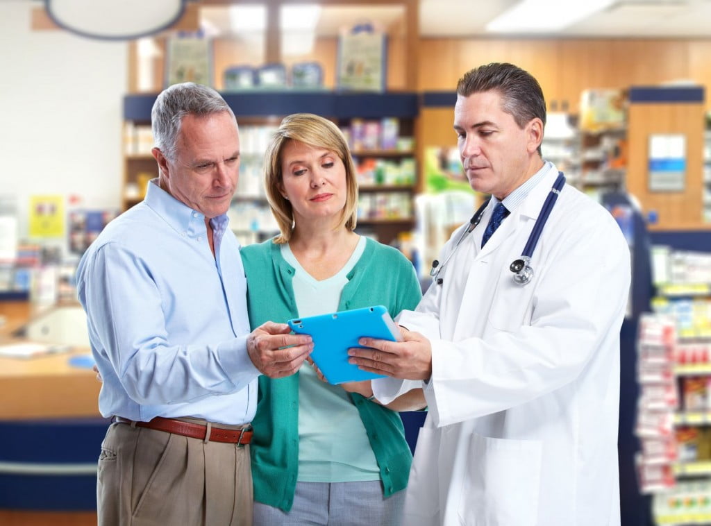 pharmacist helping customers