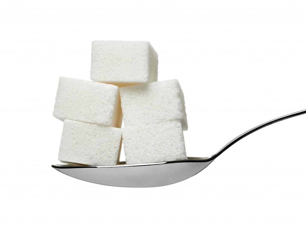 sugar cubes on a spoon