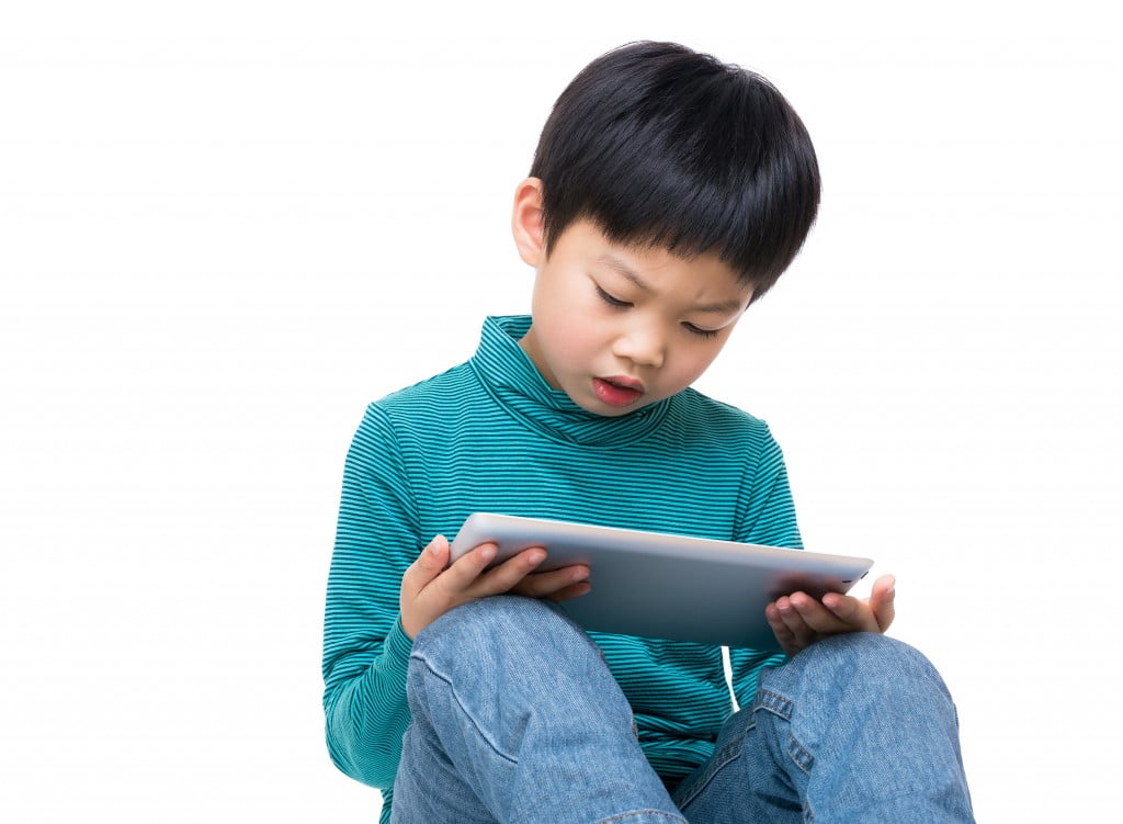 child using electronic devices