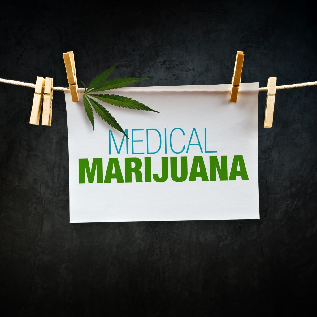 "medical marijuana" sign hung up on line with leaf