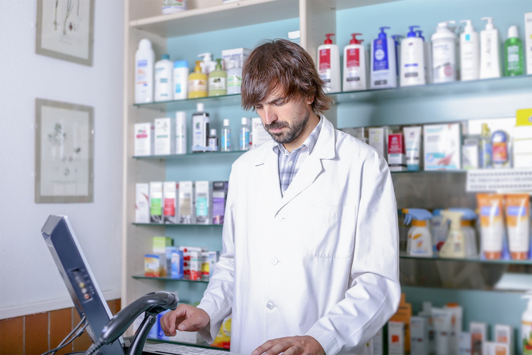 Fred IT site: pharmacist at computer