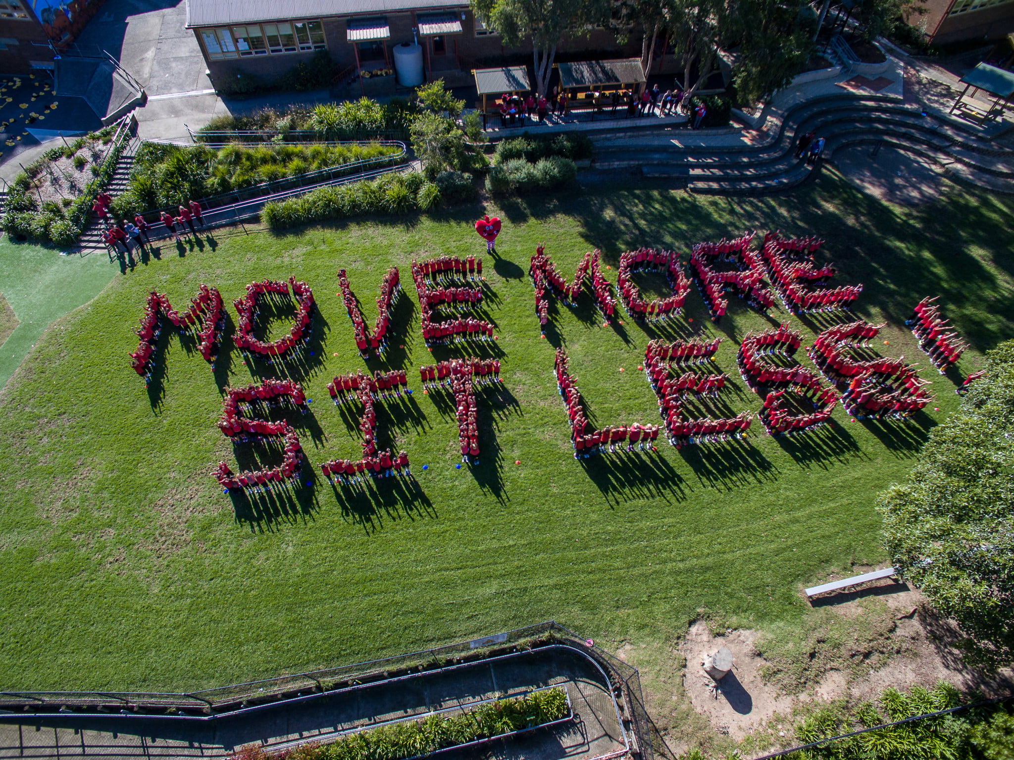 Pymble Public School students spell out "Move more sit less"