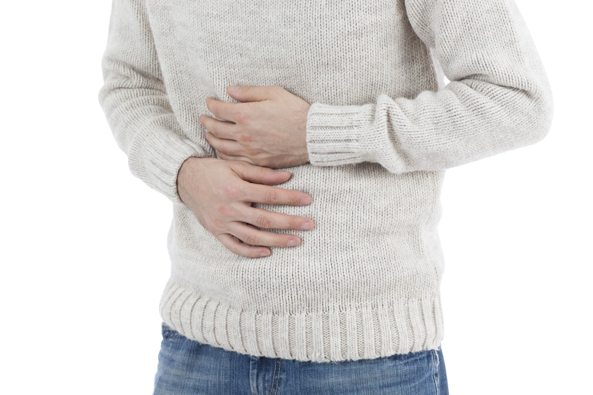 reflux, man clutches stomach