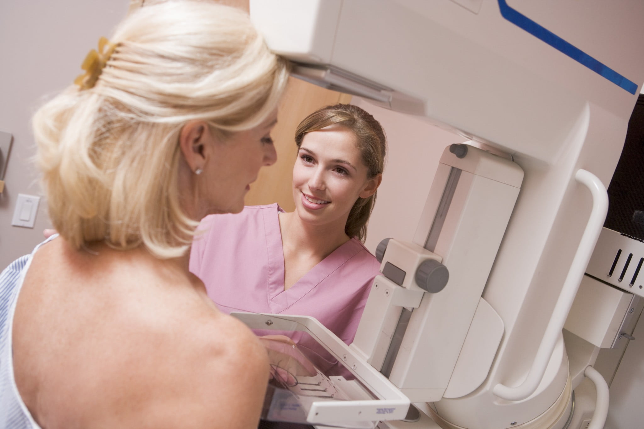 breastscreen: woman having mammogram