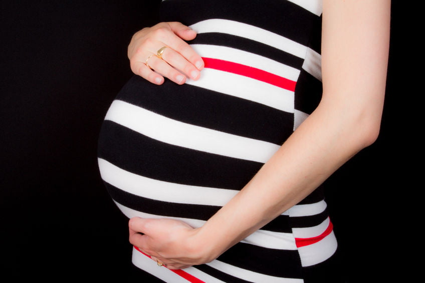 pregnant woman in striped dress