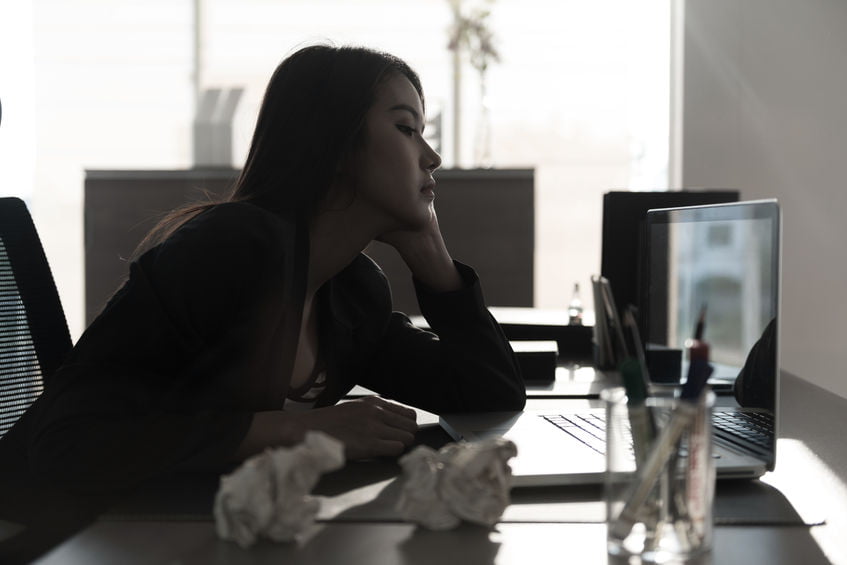 woman sitting at desk