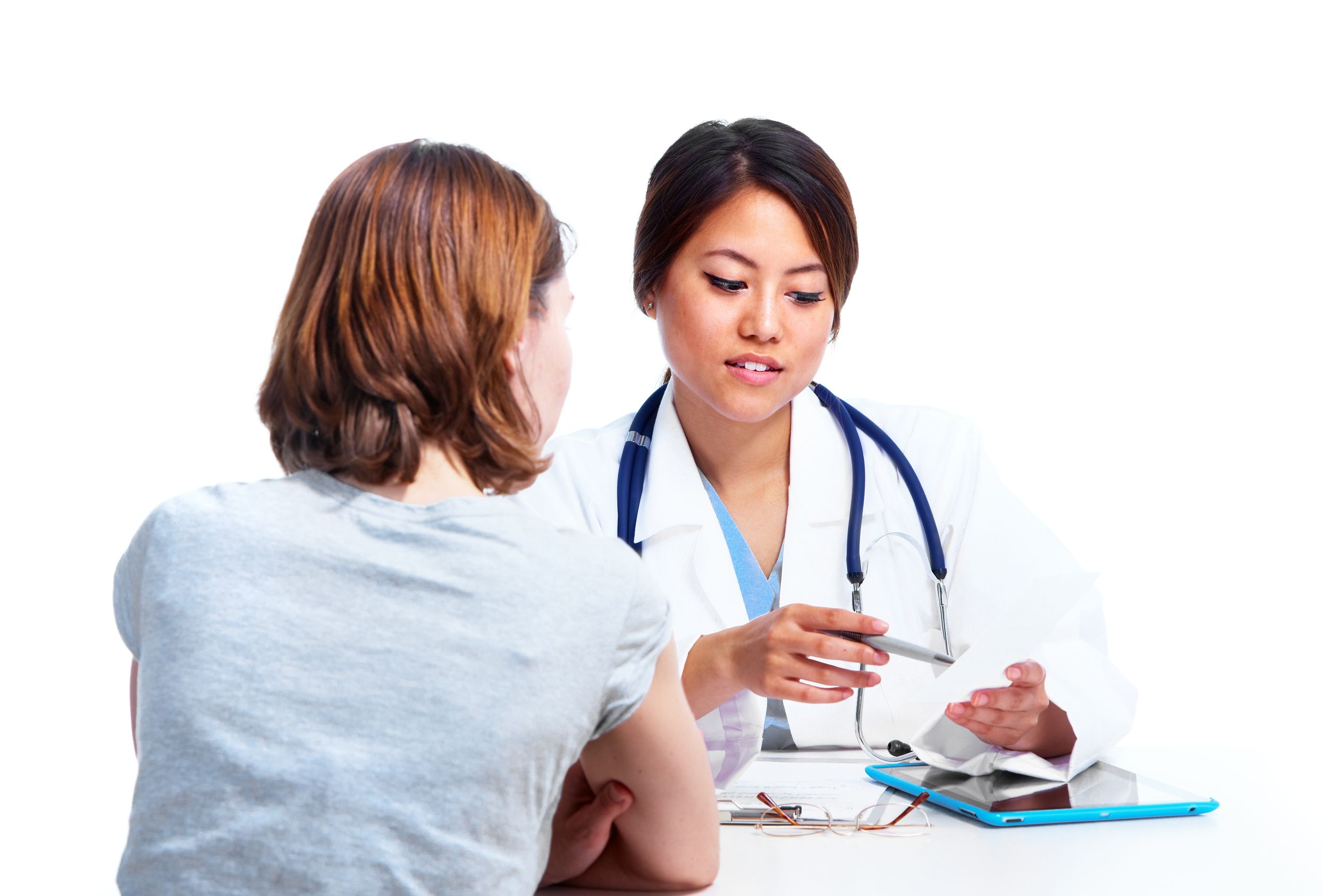 pharmacist with patient explaining medicines