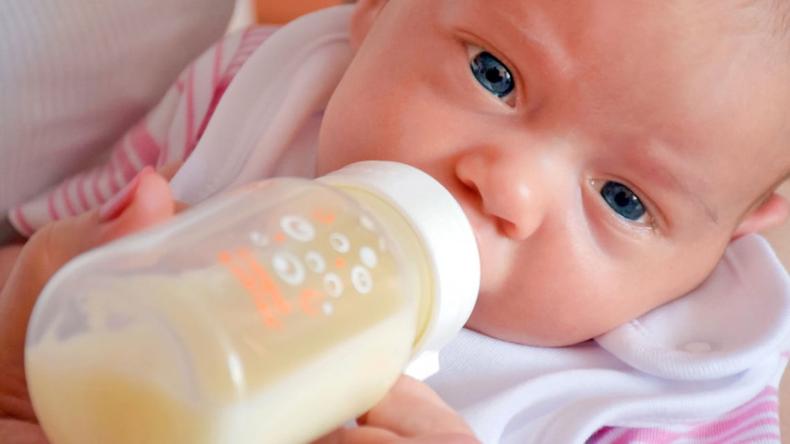 baby drinking from bottle