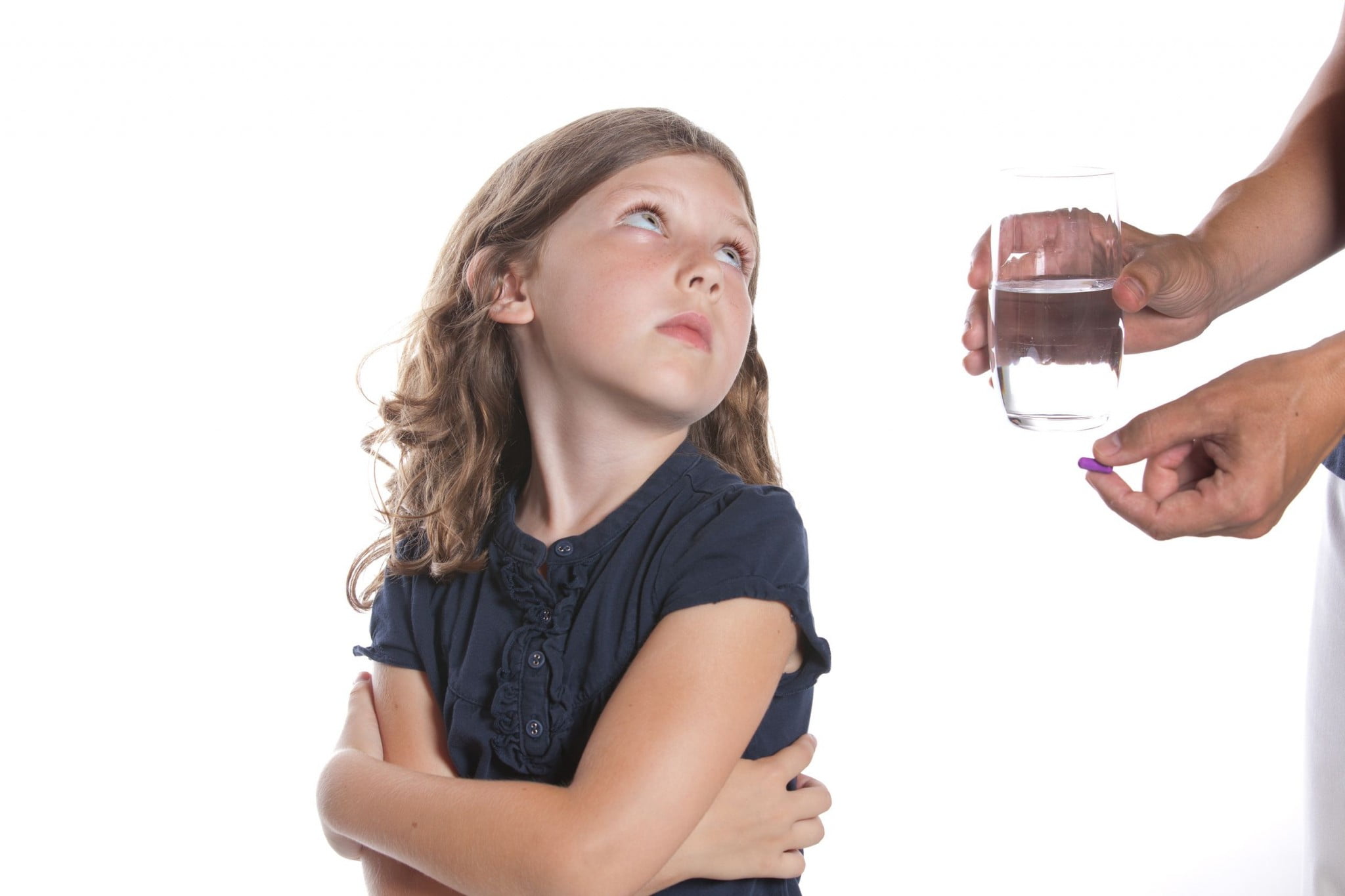 children health: little girl refuses medicine