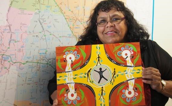 Lynette Briggs with her artwork