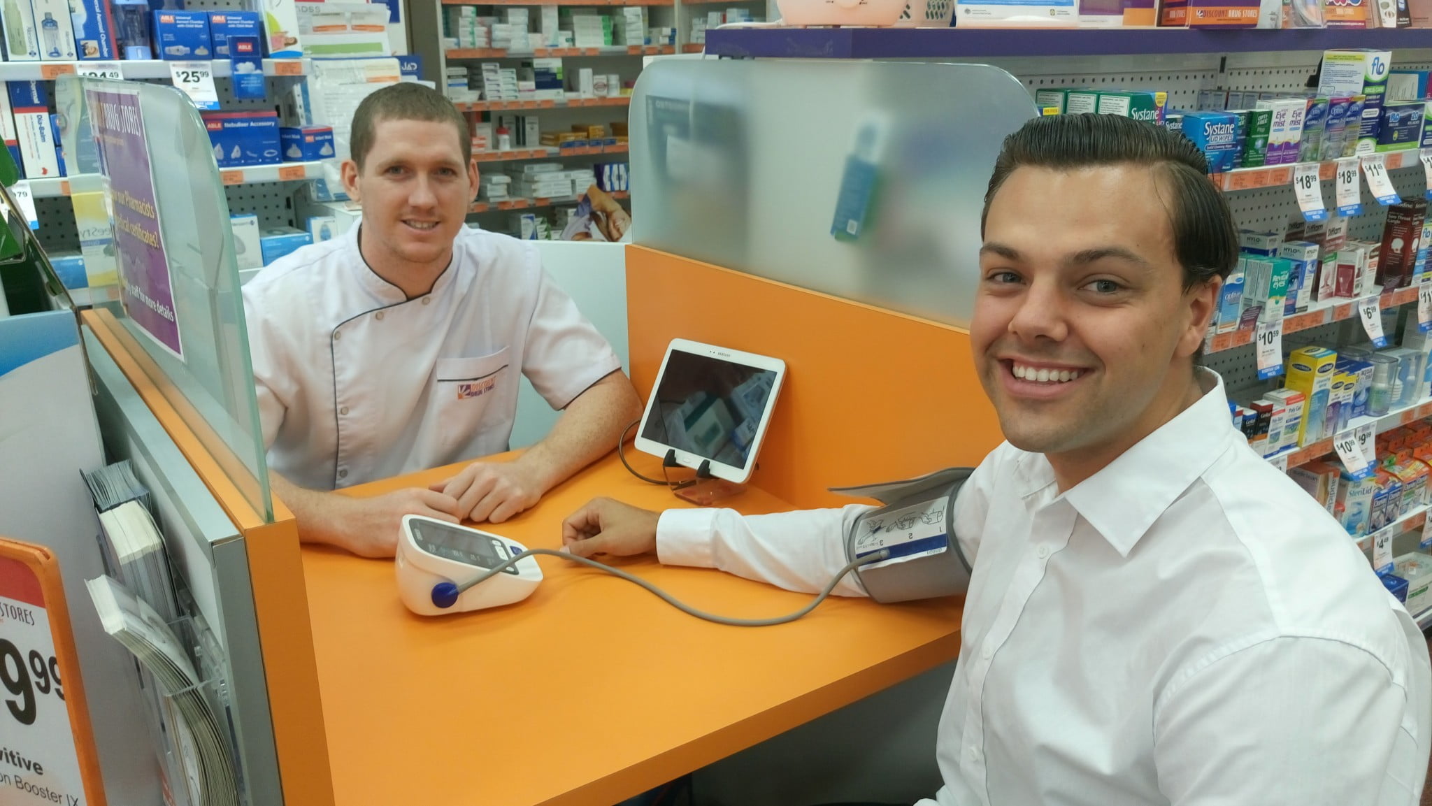 pharmacist Jack Clark offers customers screening assessments for chronic illness