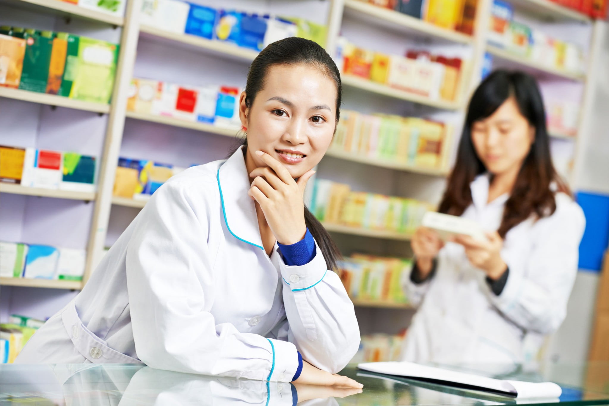 Two happy pharmacists