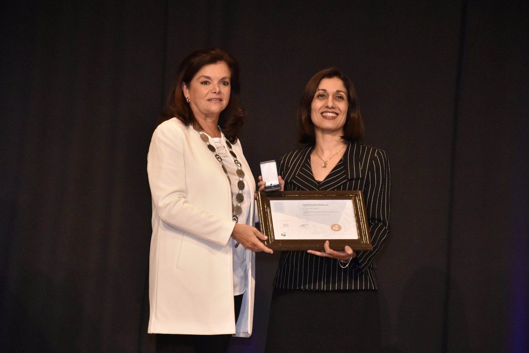 Prof Aslani accepts her fellowship