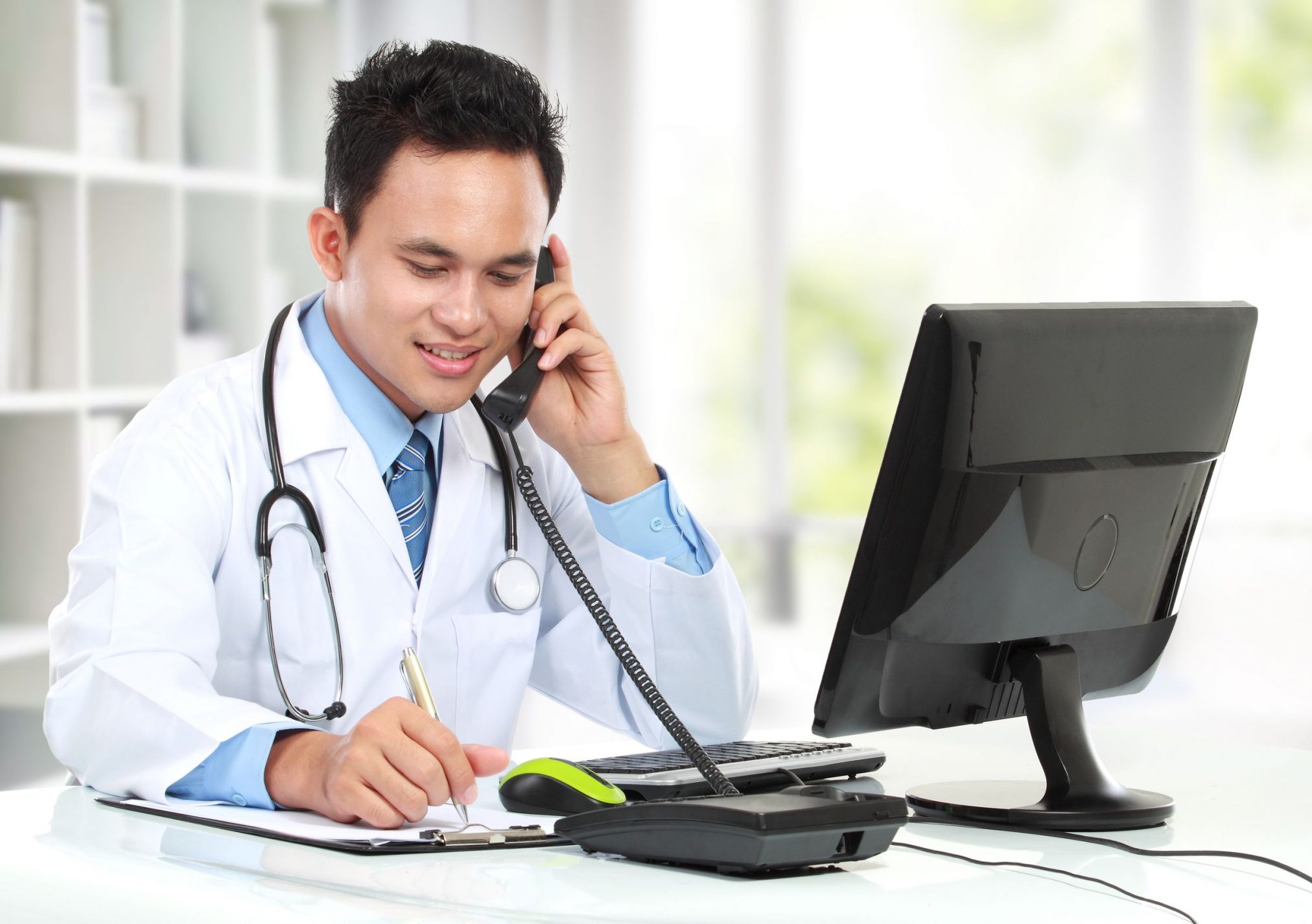 doctor at computer