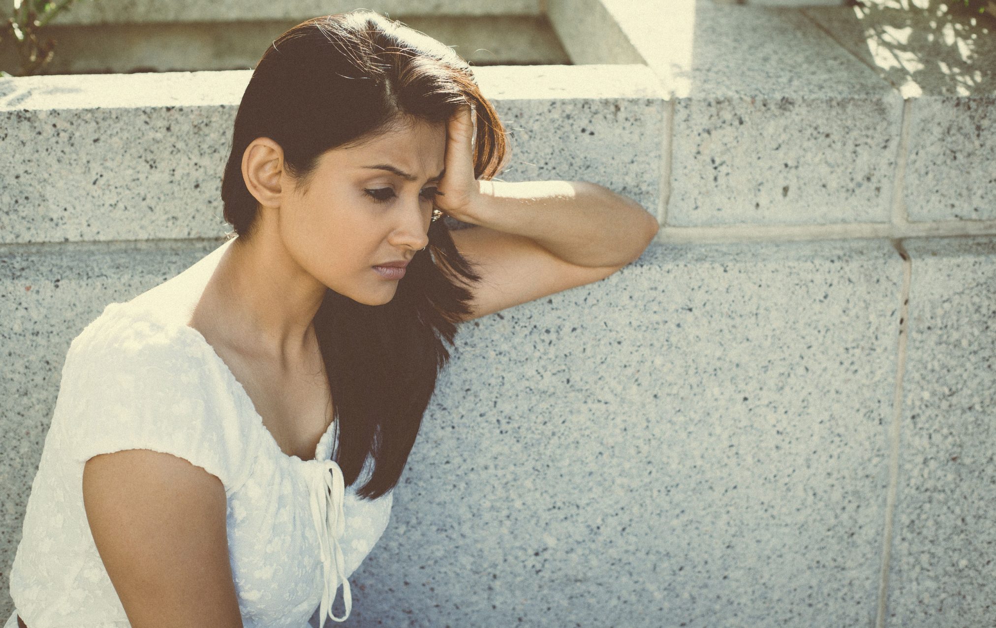 sad woman looking despondent
