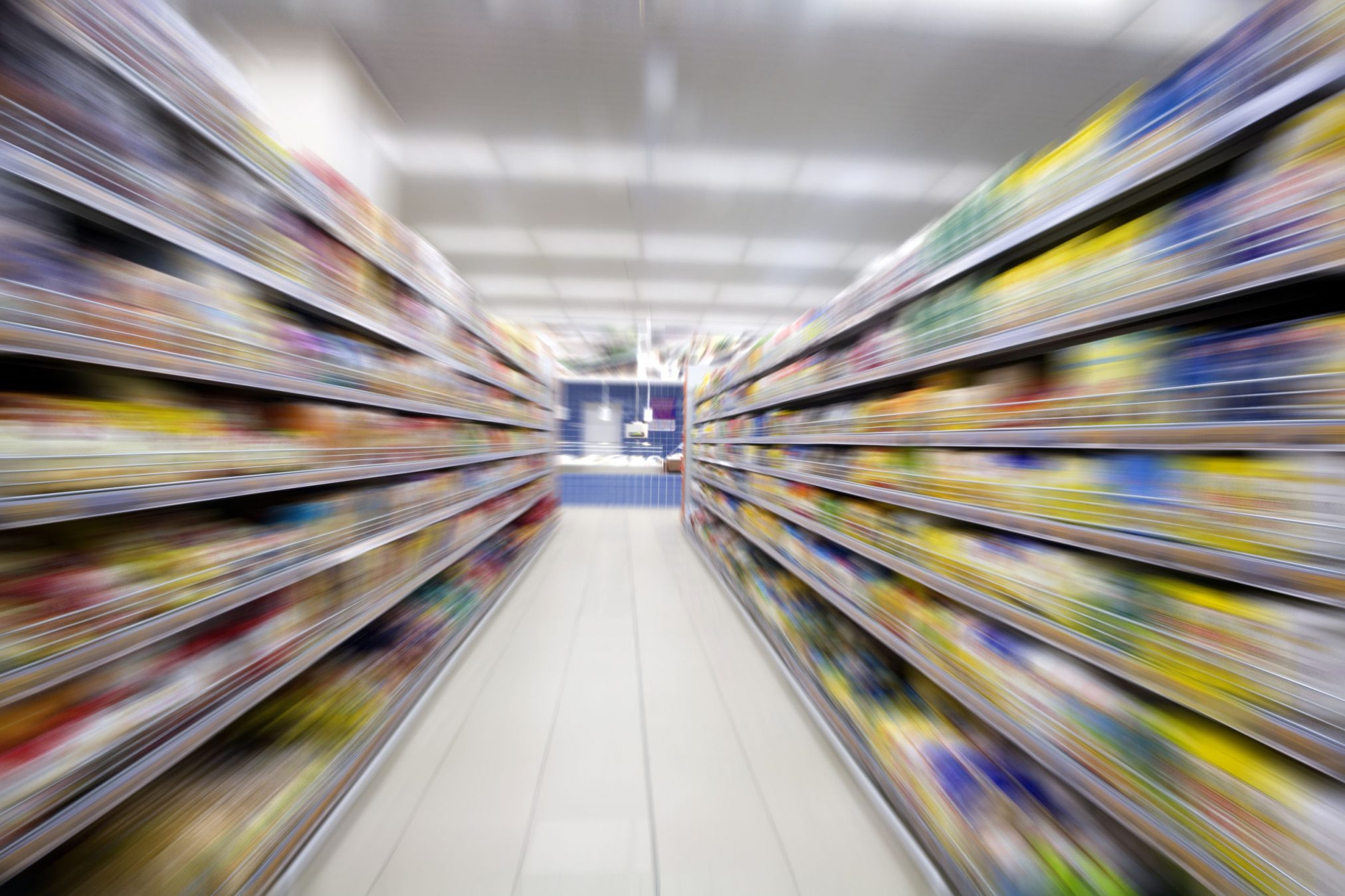 36880436 - empty supermarket aisle,motion blur