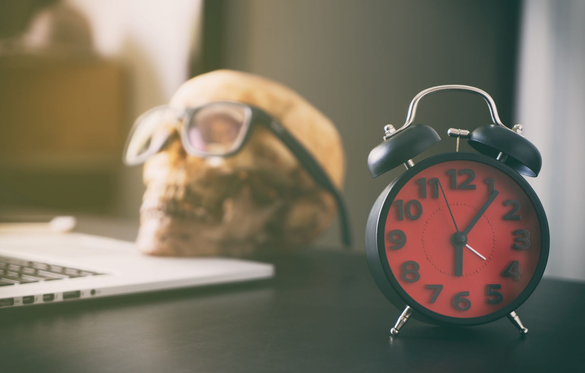 red clock and skull