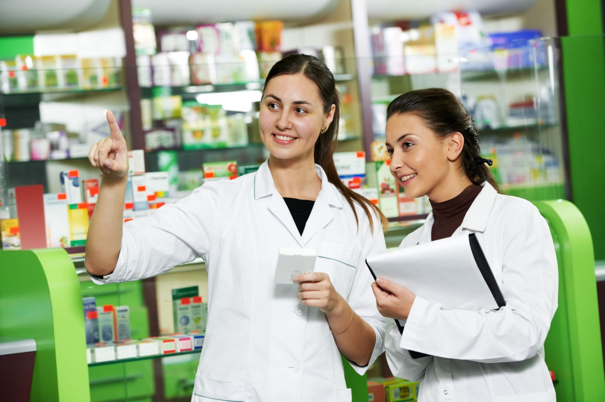 Pharmacy assistants talking