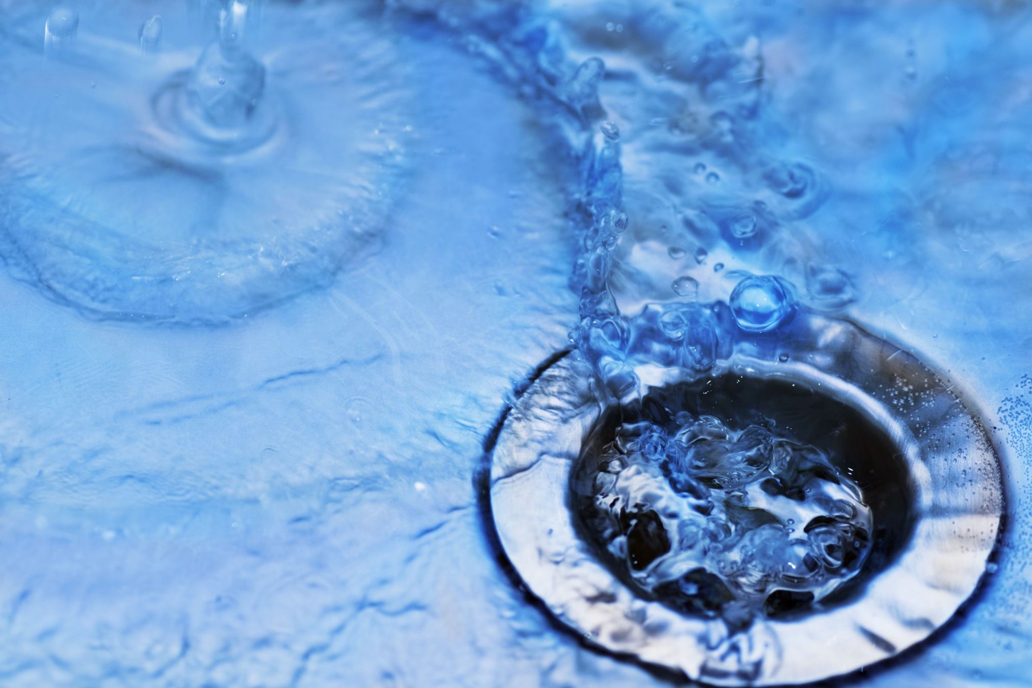 water going down sink tap drip