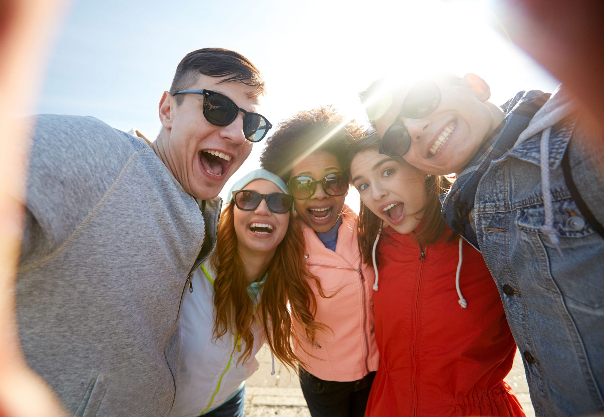 teenagers taking selfie