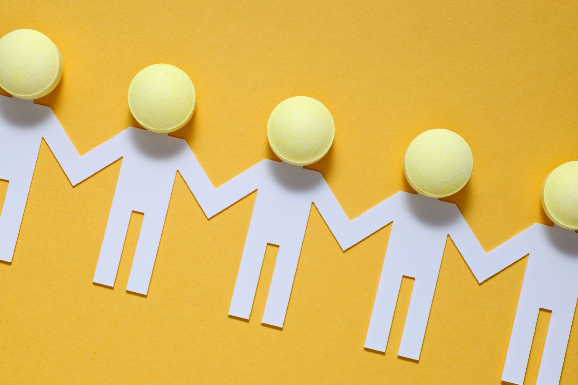 paper dolls holding hands