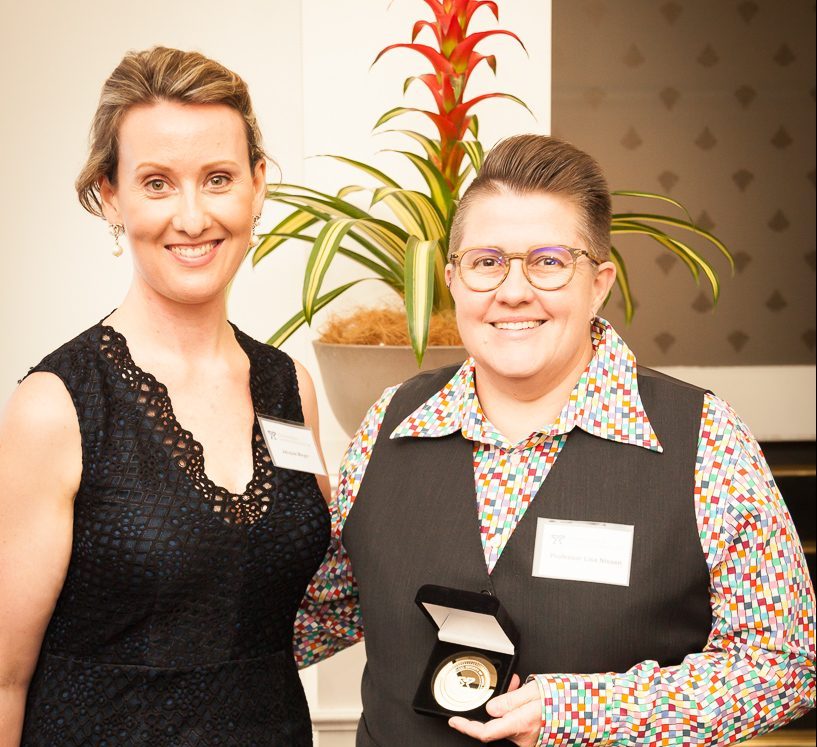 Prof Lisa Nissen FPS receives the PSA QLD Gold Medal Award from Queensland Branch President Jacqueline Meyer.
