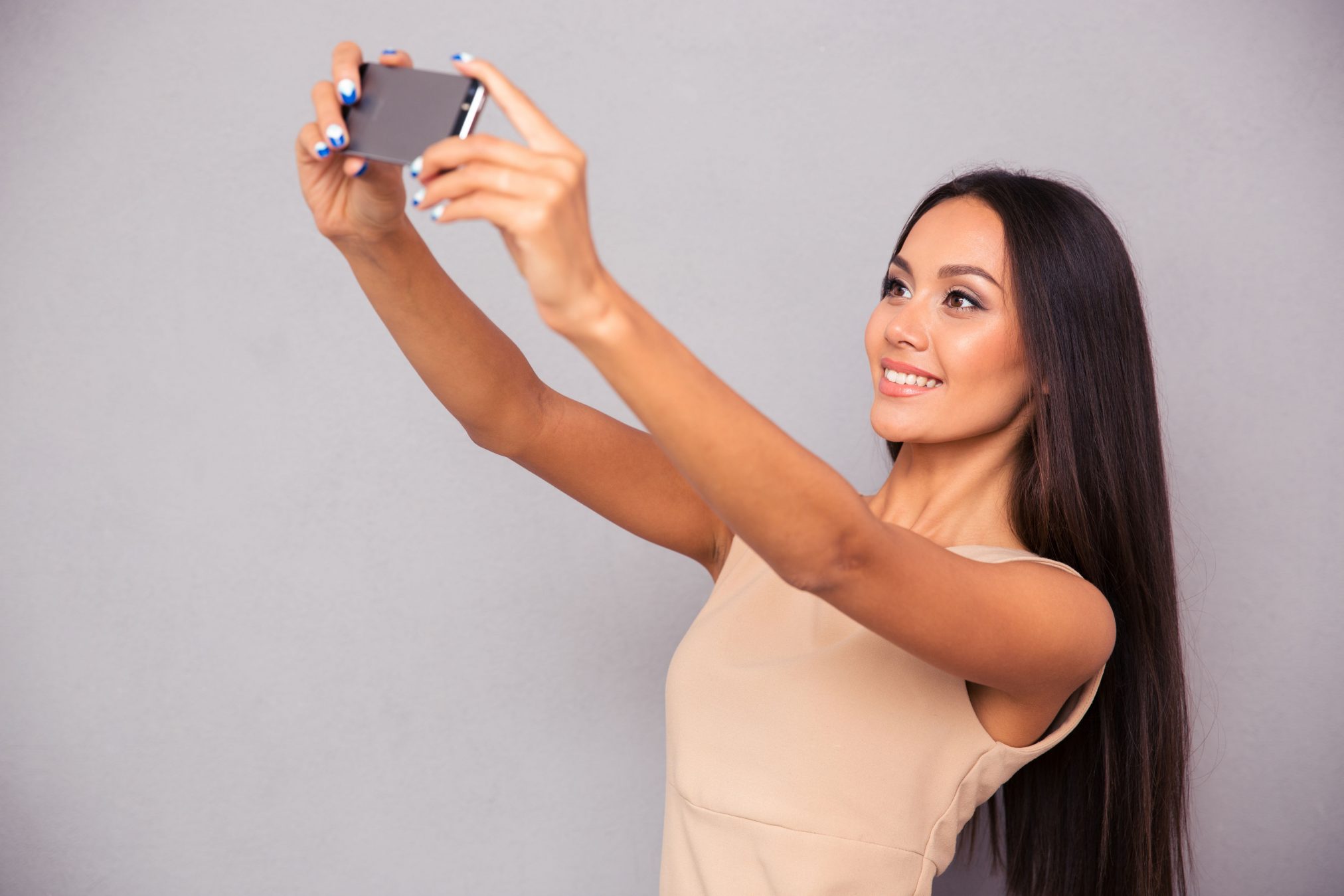 young woman taking a selfie