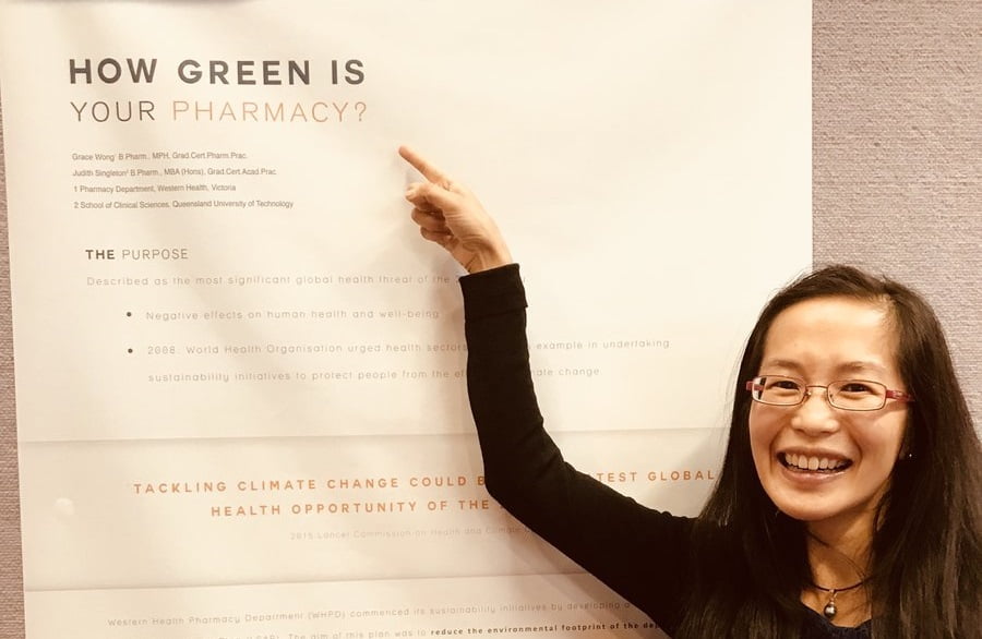 Grace Wong with her winning poster. Credit: Allan Nash