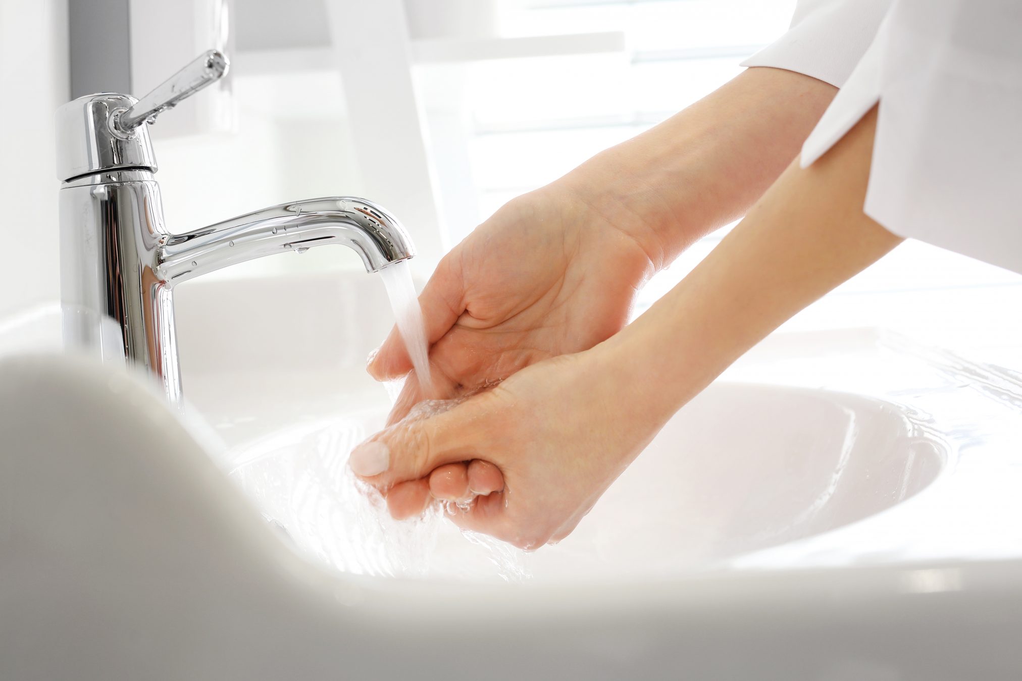 health professional washing hands