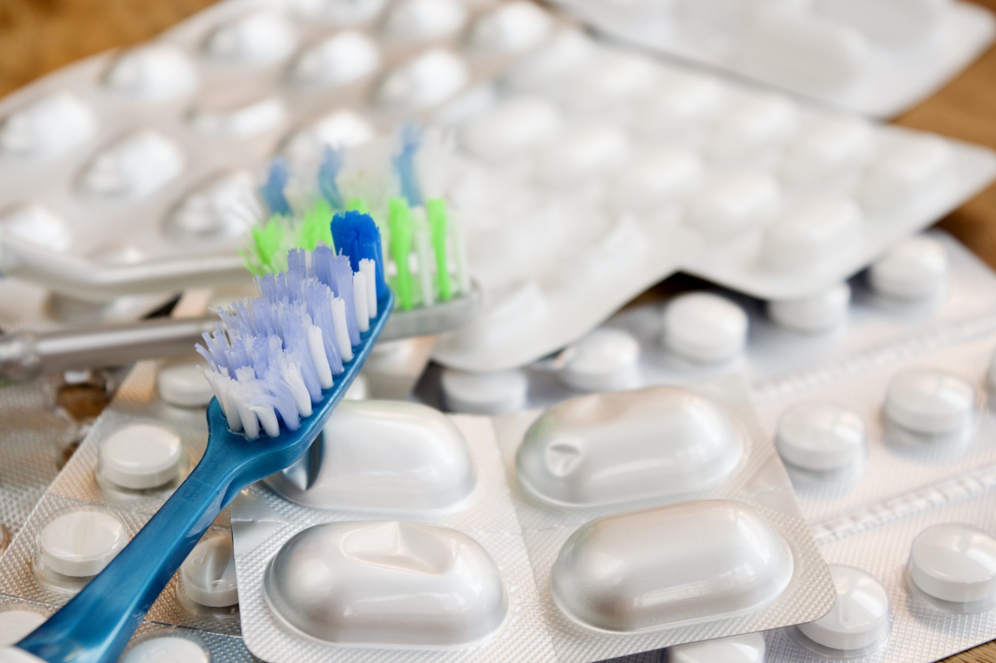 toothbrush and pills