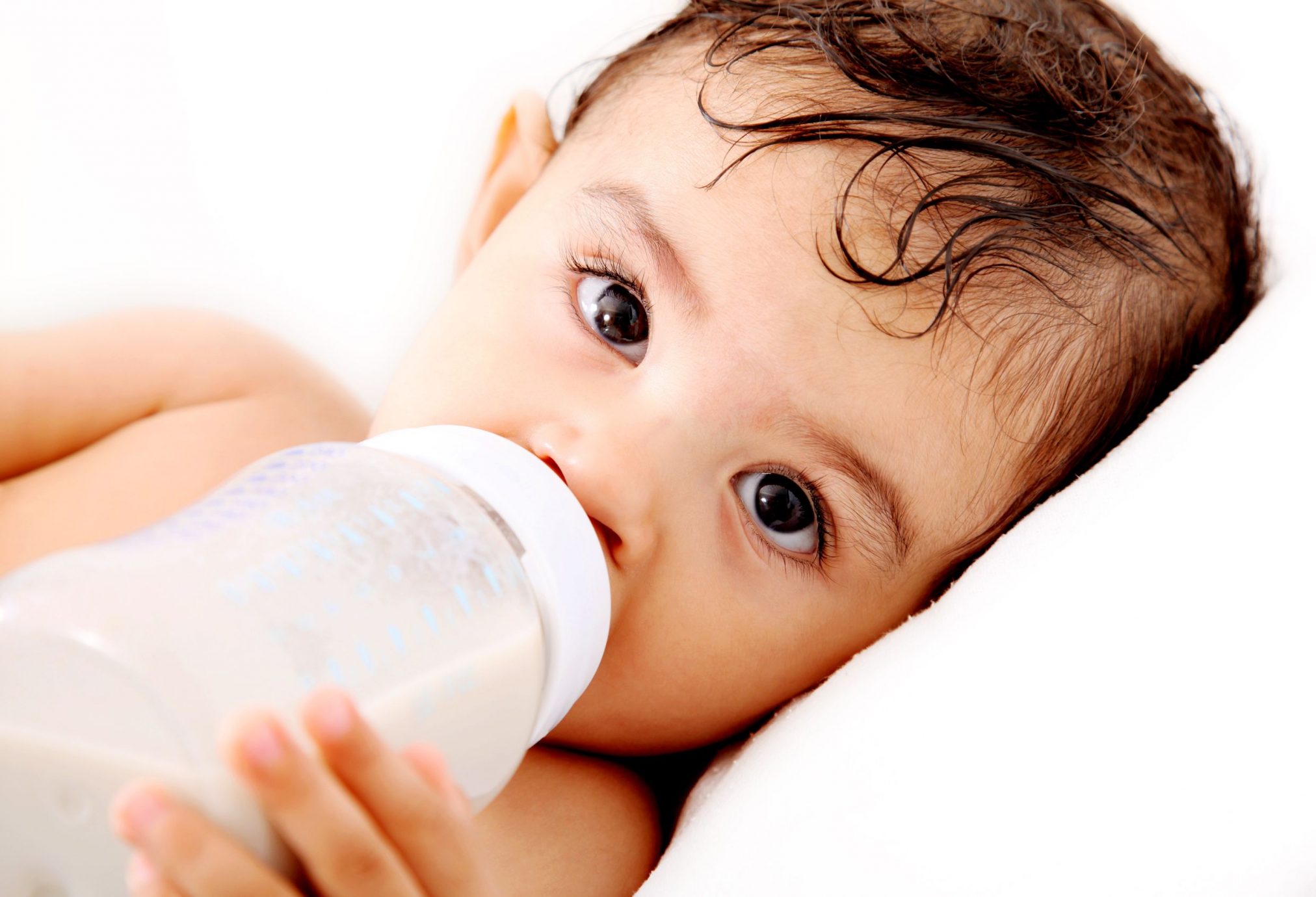 baby drinking from bottle