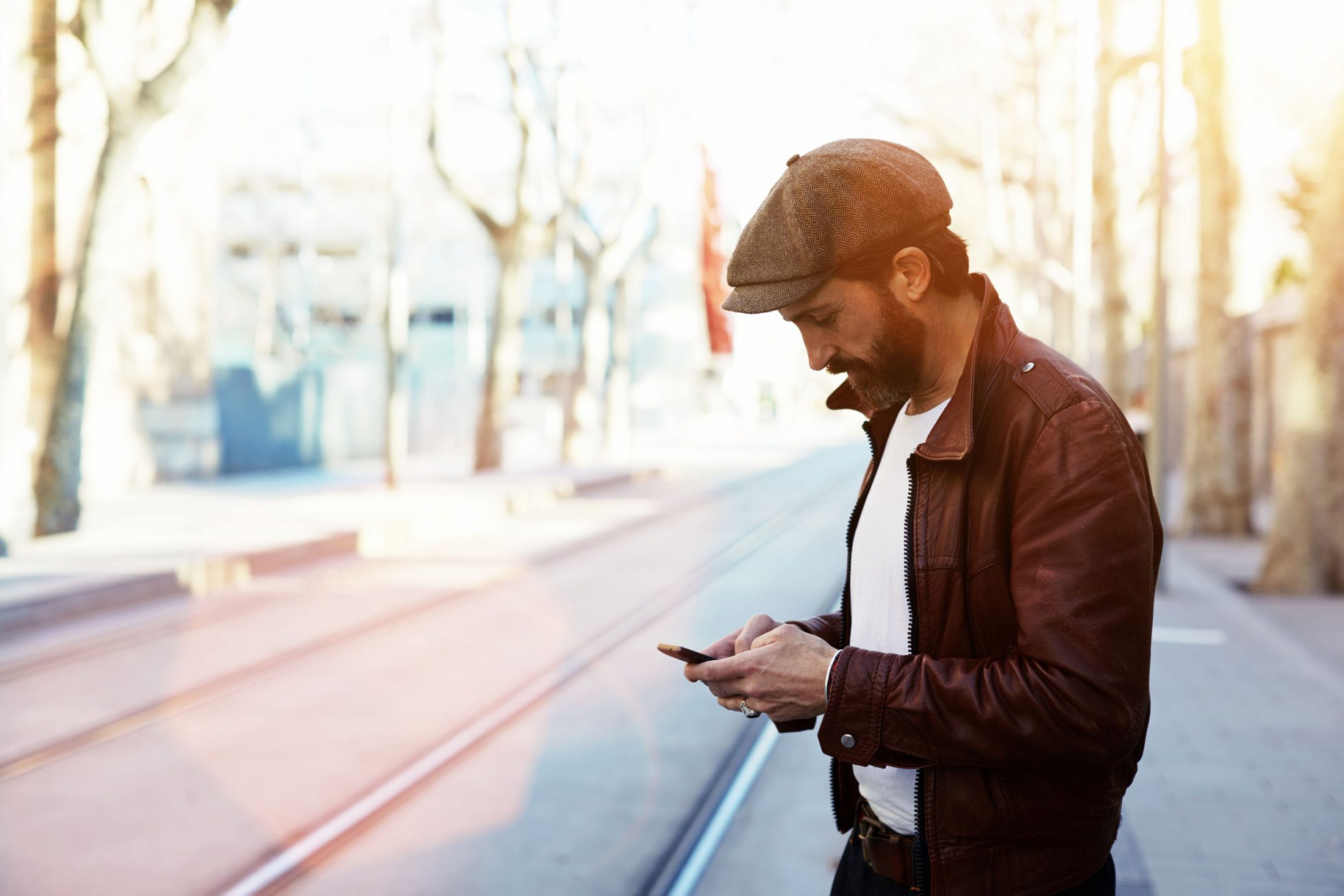 hipster looking at smartphone