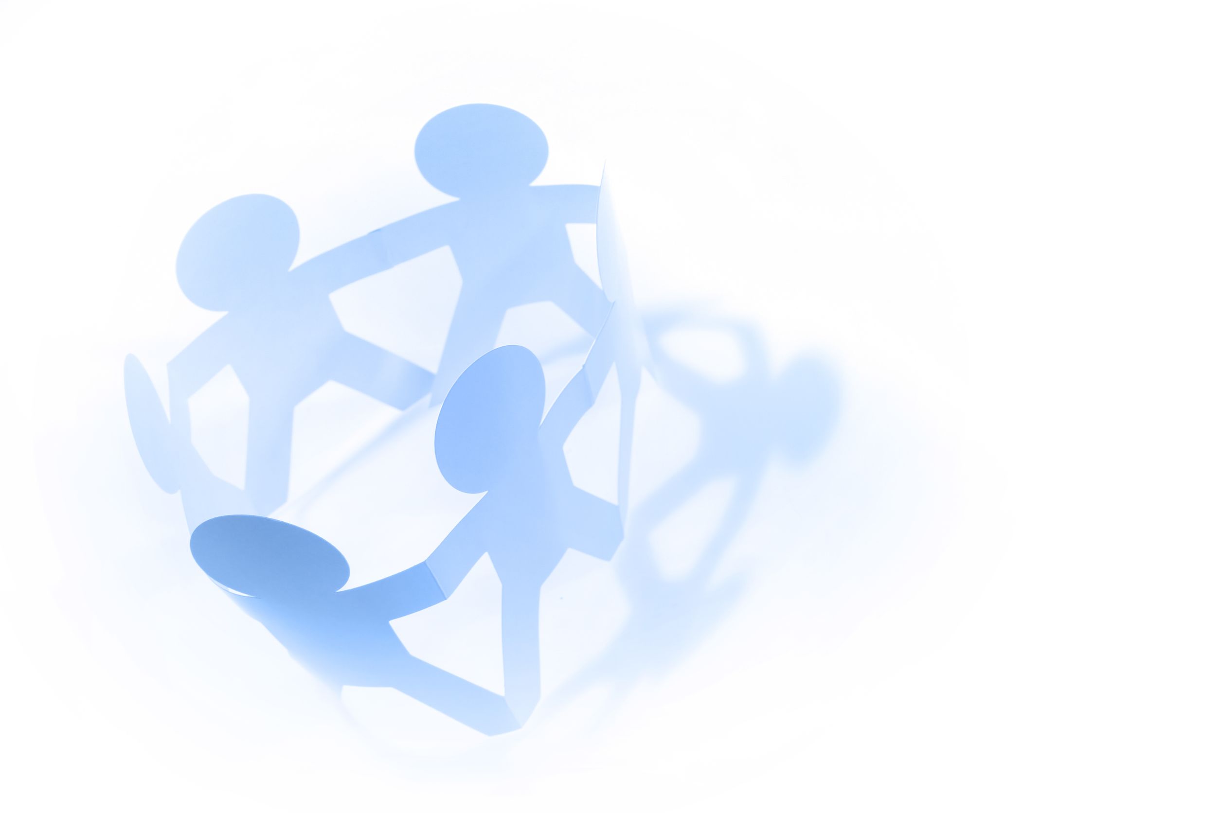group of paper people holding hands