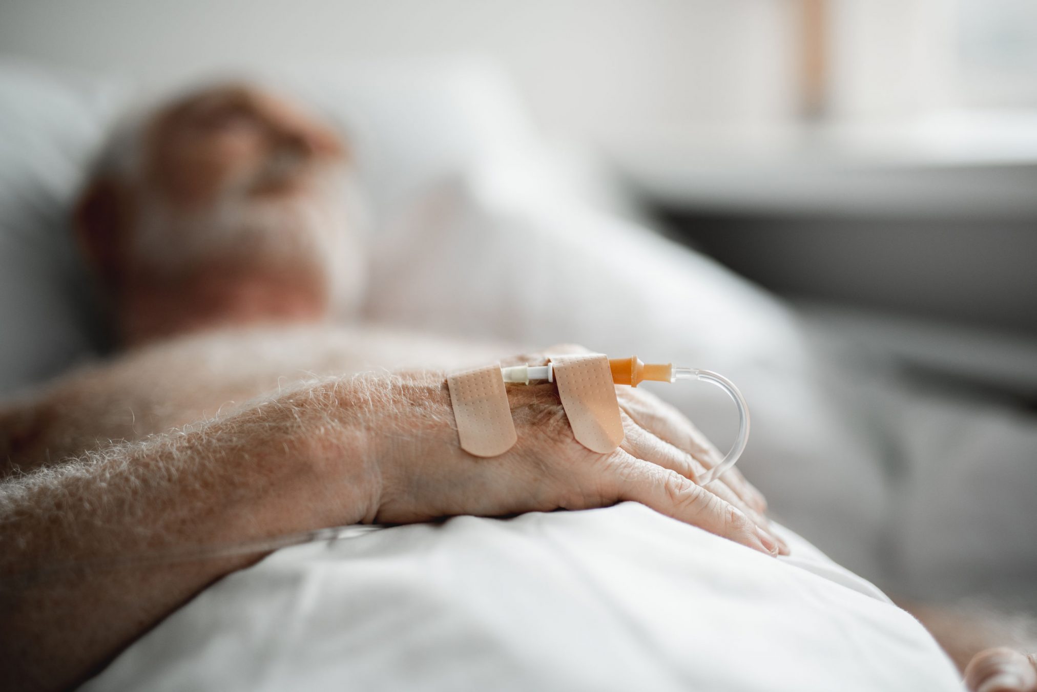 old elderly man IV hospital