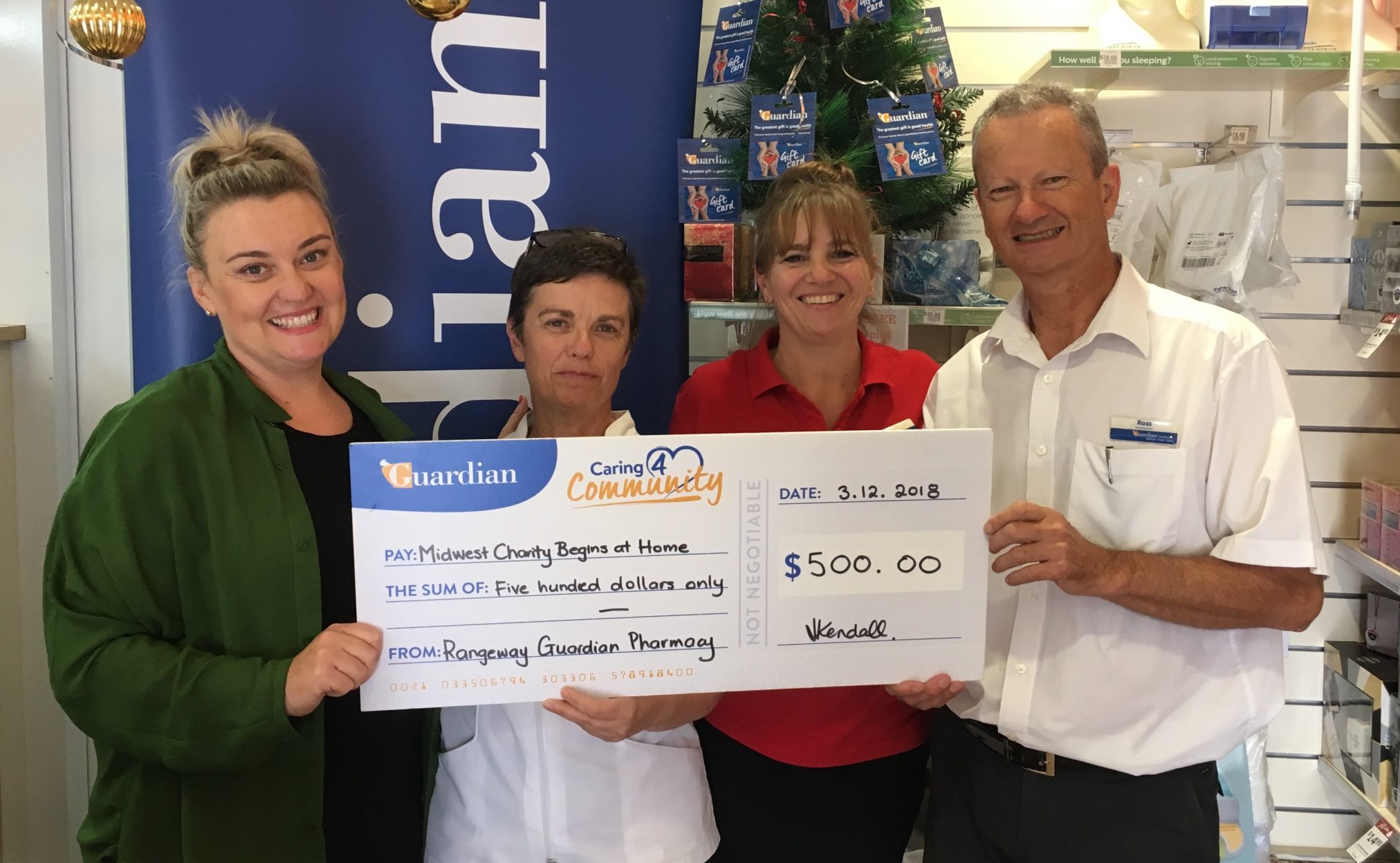 angeway Guardian Pharmacy hold up big cheque