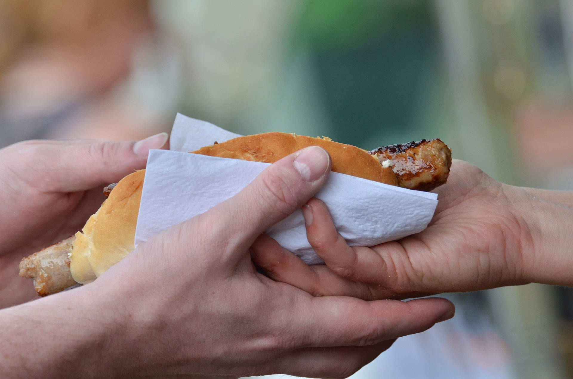 sausage sandwich changing hands