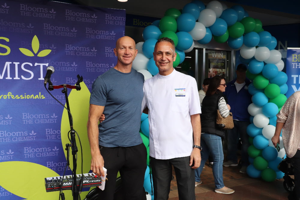 Adam McDougall with Markos Atalla