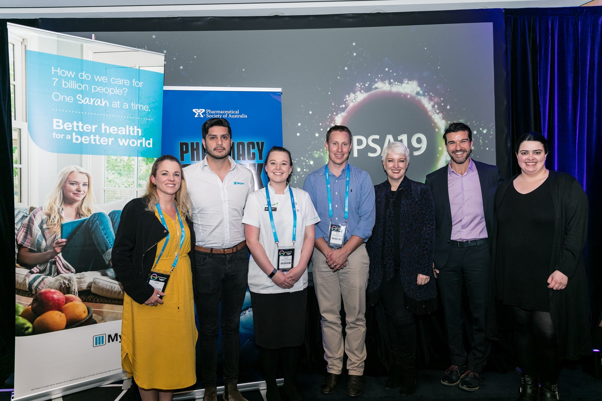(L-R) Shannon Lawrence, Fernando Lizarraga, Brooke Veasey, Brad Butt, Cathie Reid, Joey Calandra, and Natalie D’Onofrio.