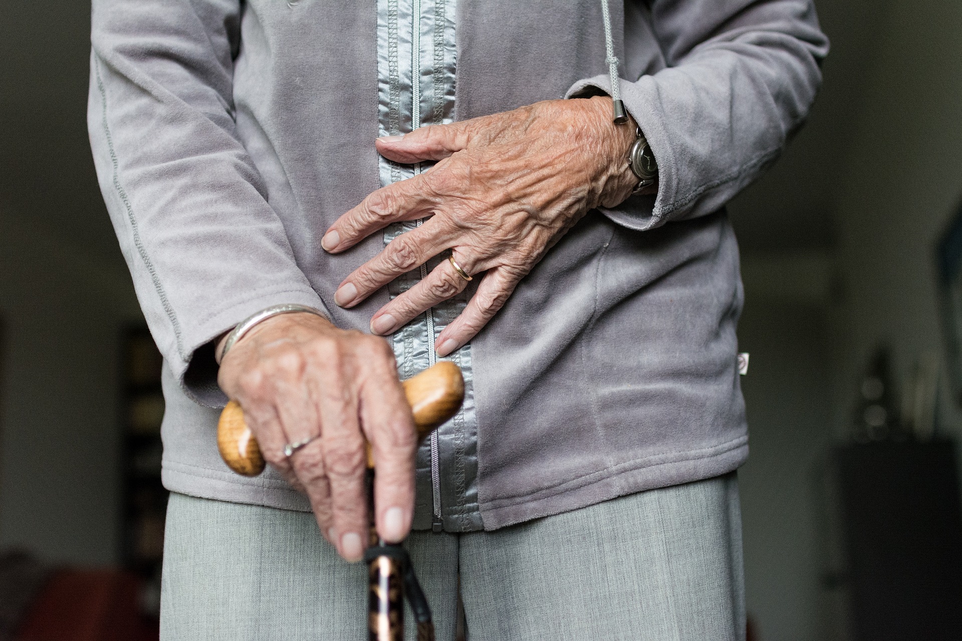Woman with walking stick